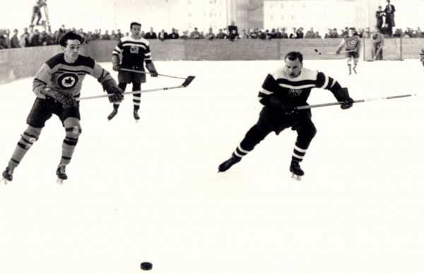Photograph of RCAF Flyers at hockey game on outdoor rink