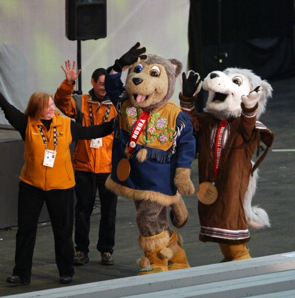 Husky dog mascots wearing parkas