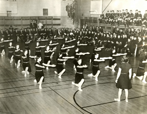 photograph of women doing gymnastics demonstration