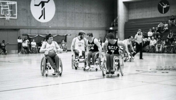 photograph of Rick Hansen playing wheelchair basketball