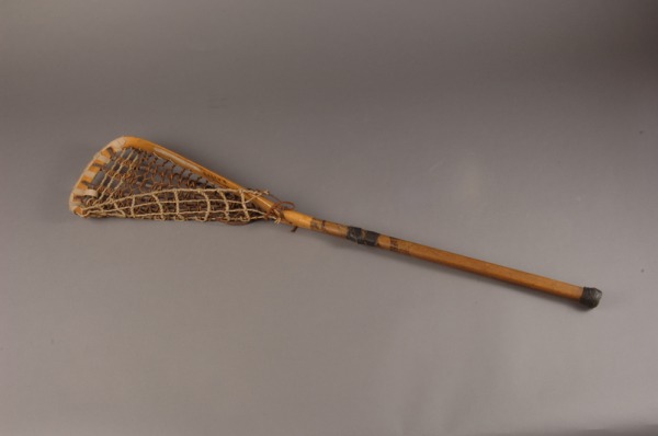 lacrosse stick with wood handle and leather basket