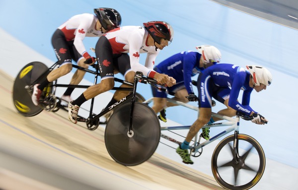 teams of two cyclists racing on track