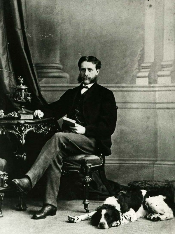 photograph of George Beers seated at desk