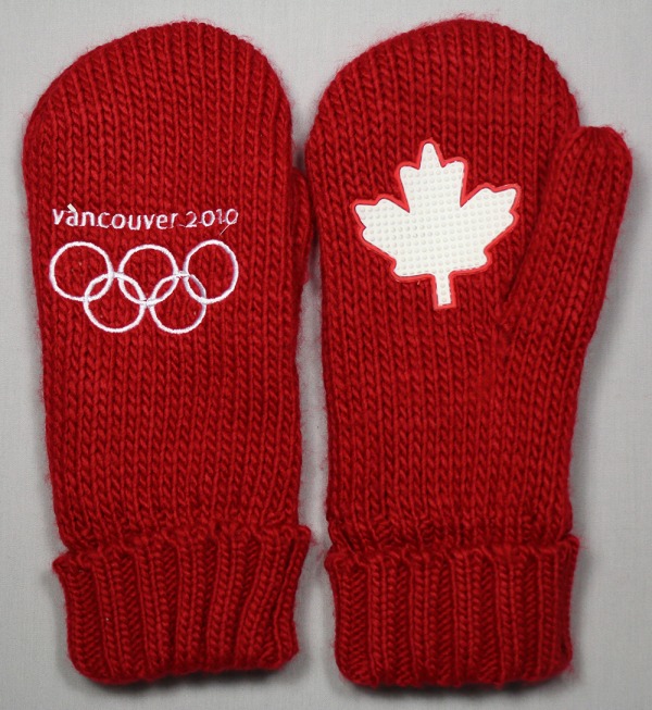 red mittens with white logo and maple leaf