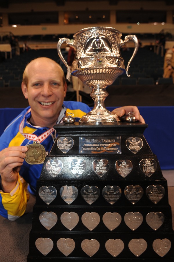 Photograph of Kevin Martin with Brier trophy
