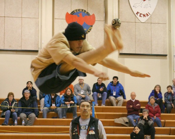 Image of athlete doing the two-foot high kick at the 2006 Kenai Peninsula Arctic Winter Games